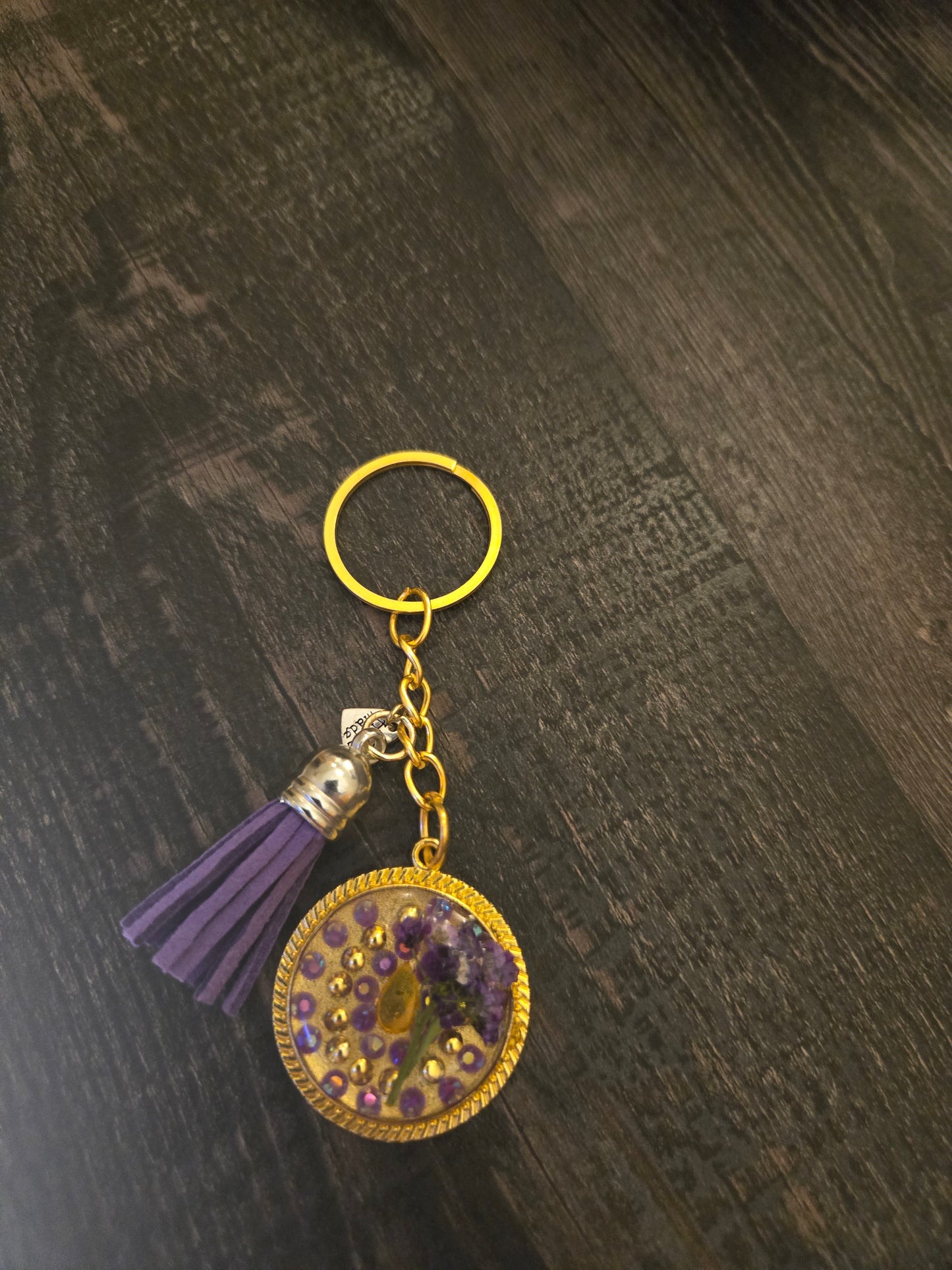 Gold Resin Keychain with Purple Tassel & Real Flower Accent