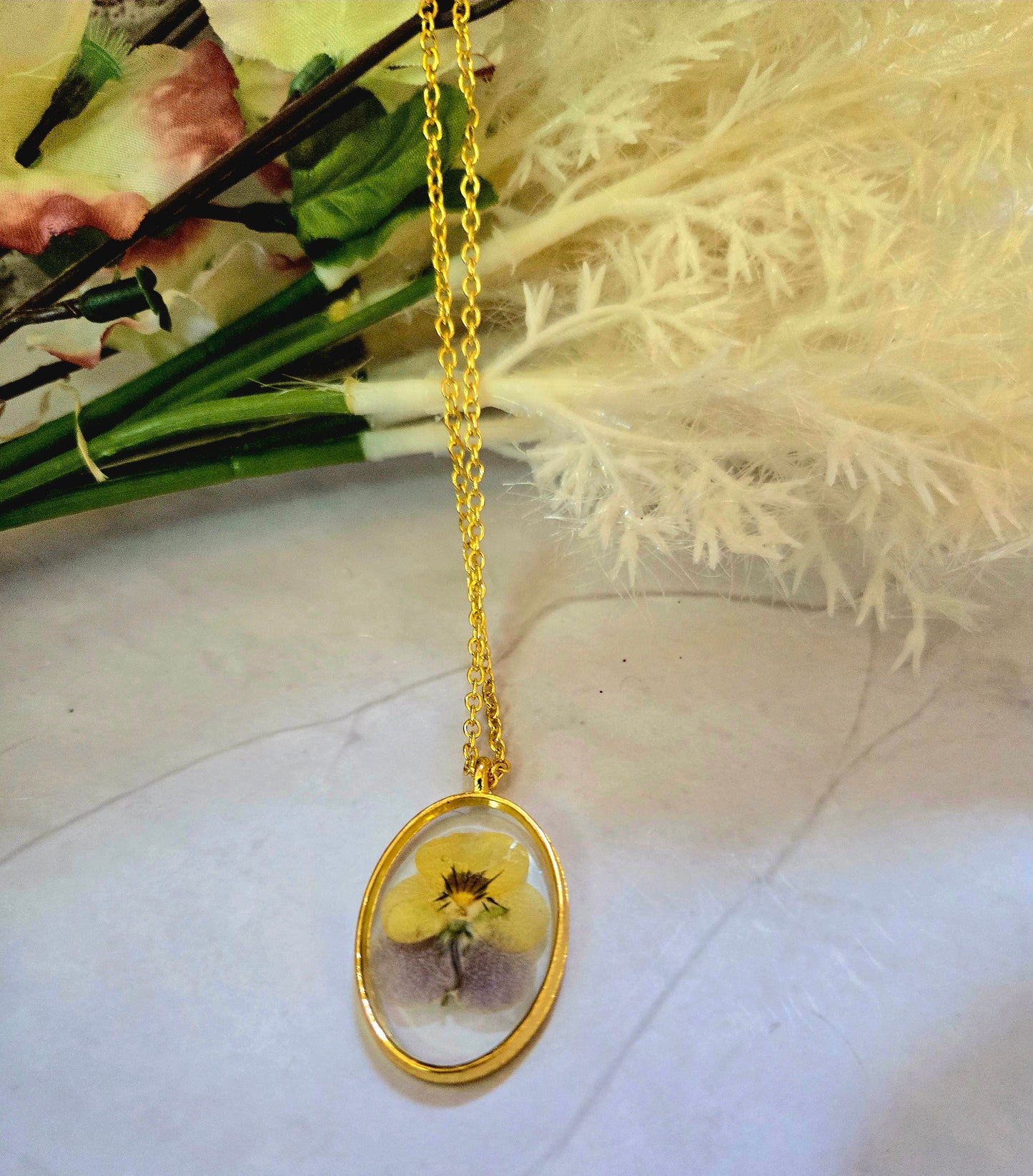 Pressed Flower Necklace – Real Yellow & Purple Blossom in Gold Oval Pendant