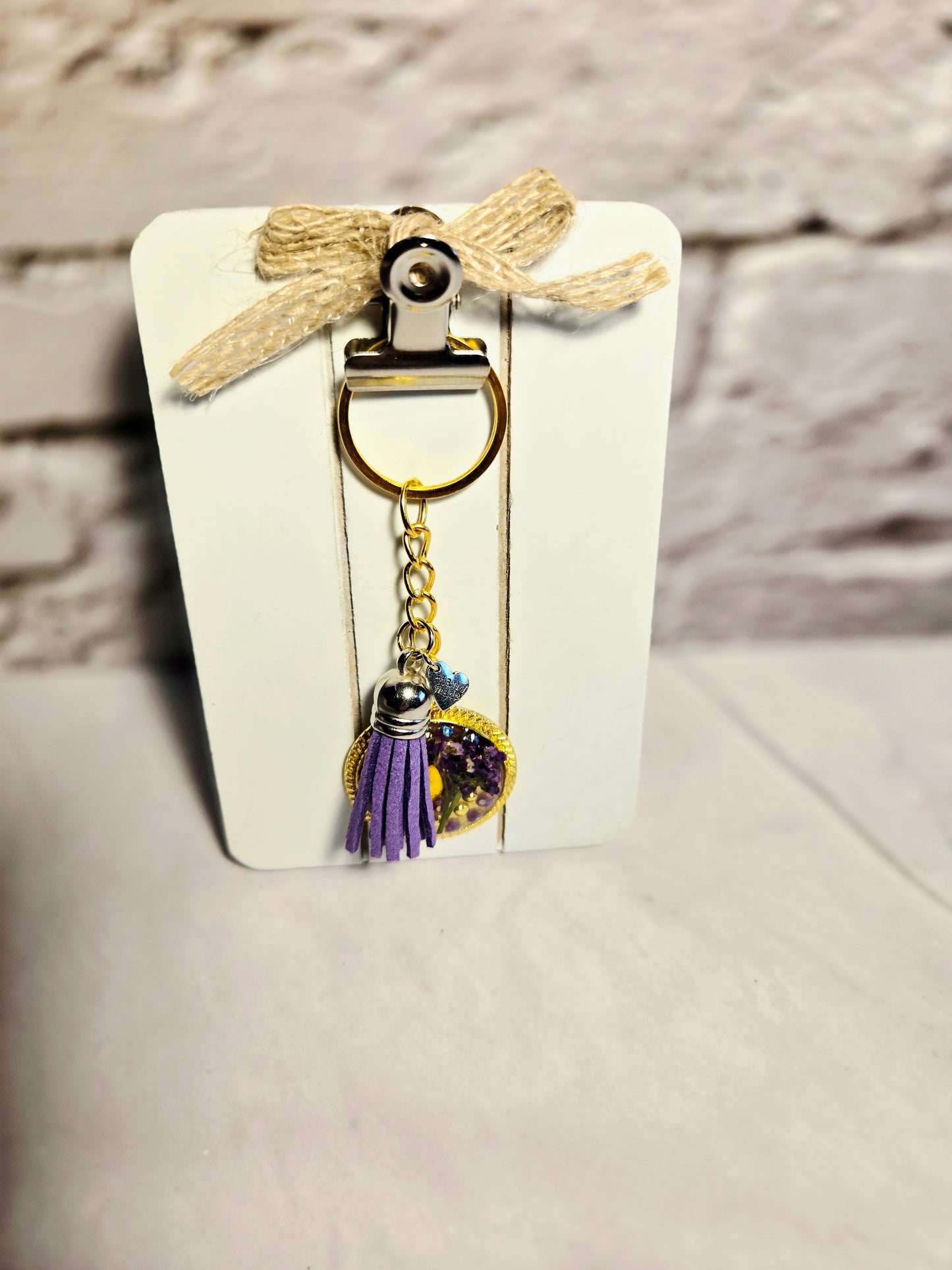 Gold Resin Keychain with Purple Tassel & Real Flower Accent