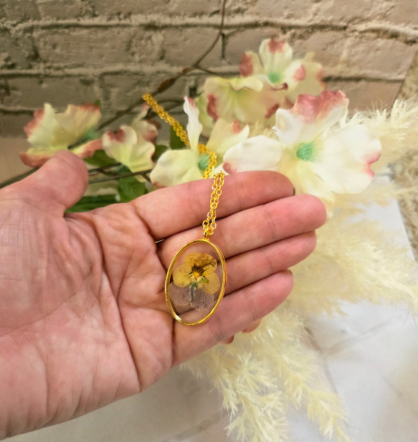 Pressed Flower Necklace – Real Yellow & Purple Blossom in Gold Oval Pendant
