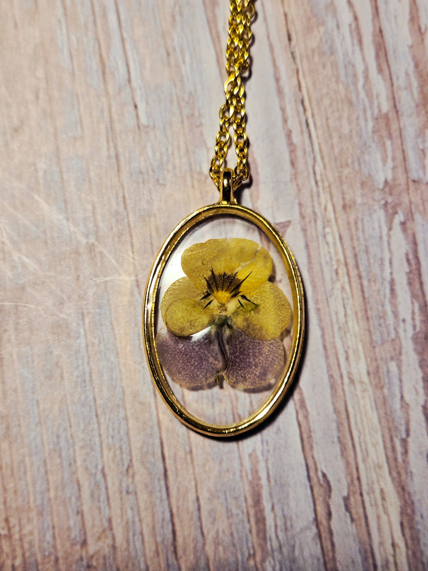 Pressed Flower Necklace – Real Yellow & Purple Blossom in Gold Oval Pendant