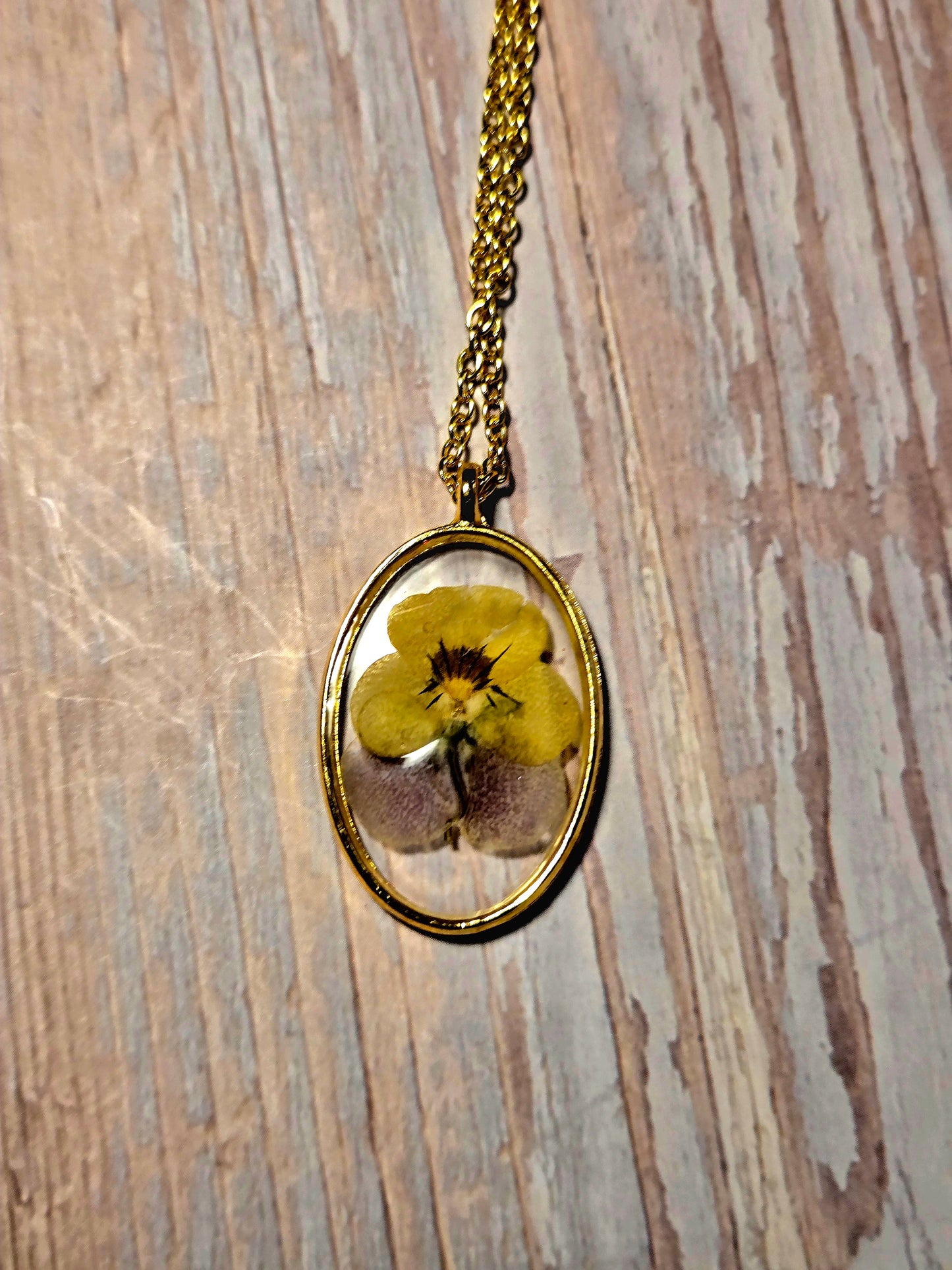 Pressed Flower Necklace – Real Yellow & Purple Blossom in Gold Oval Pendant