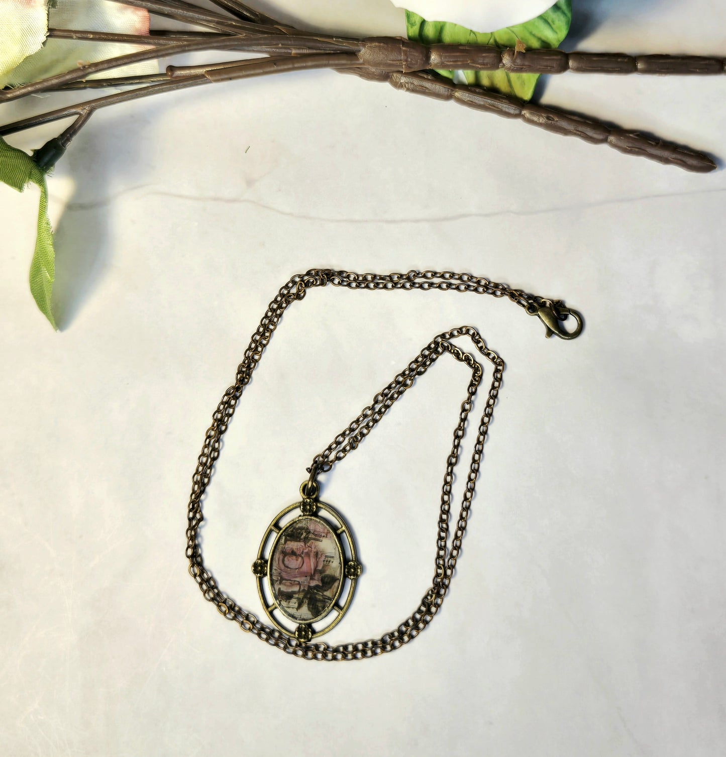 Vintage Rose Music Pendant Necklace: Antique Brass