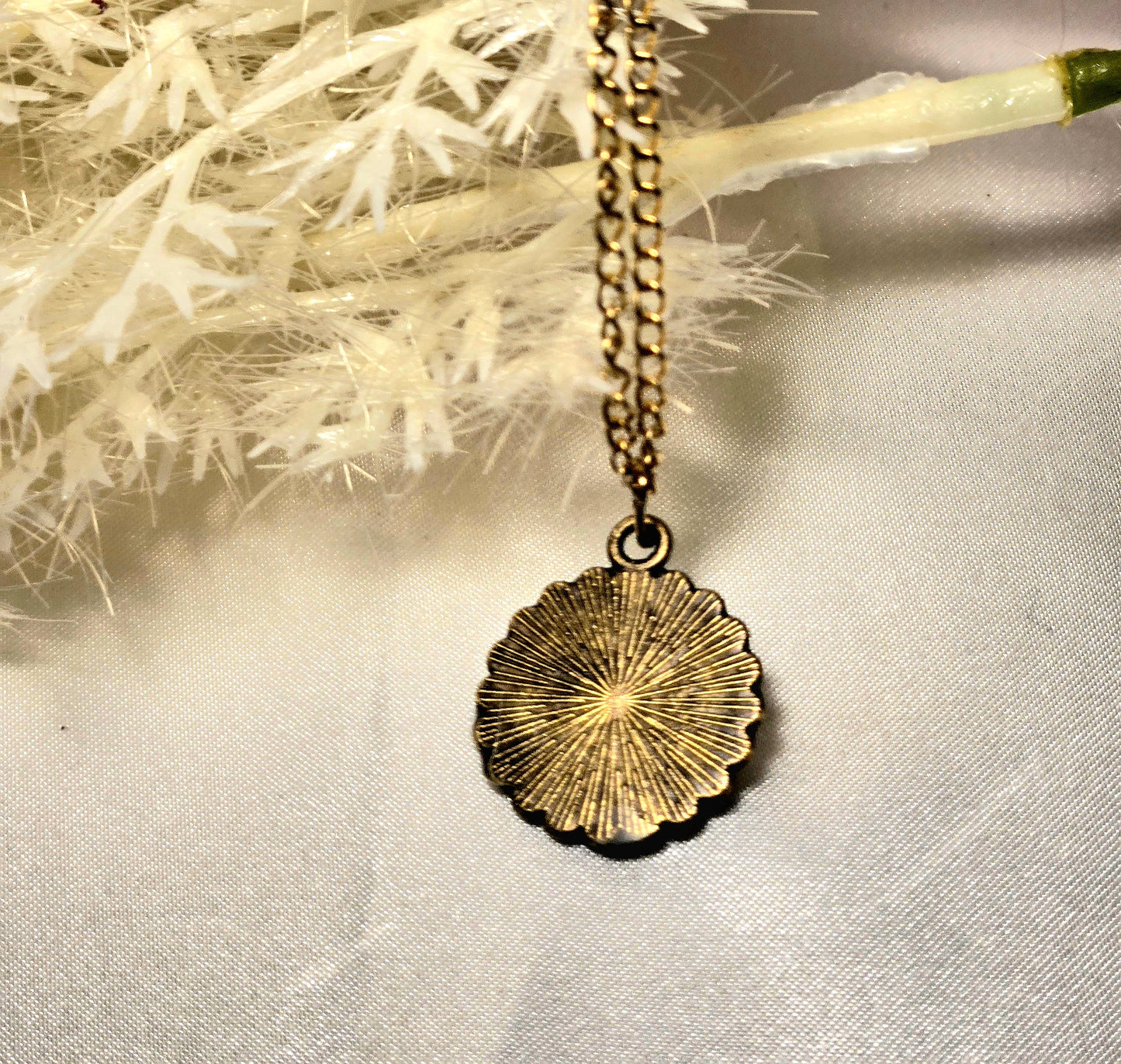 Pressed Yellow Flower Necklace – Vintage Bronze Botanical Pendant with Script Background