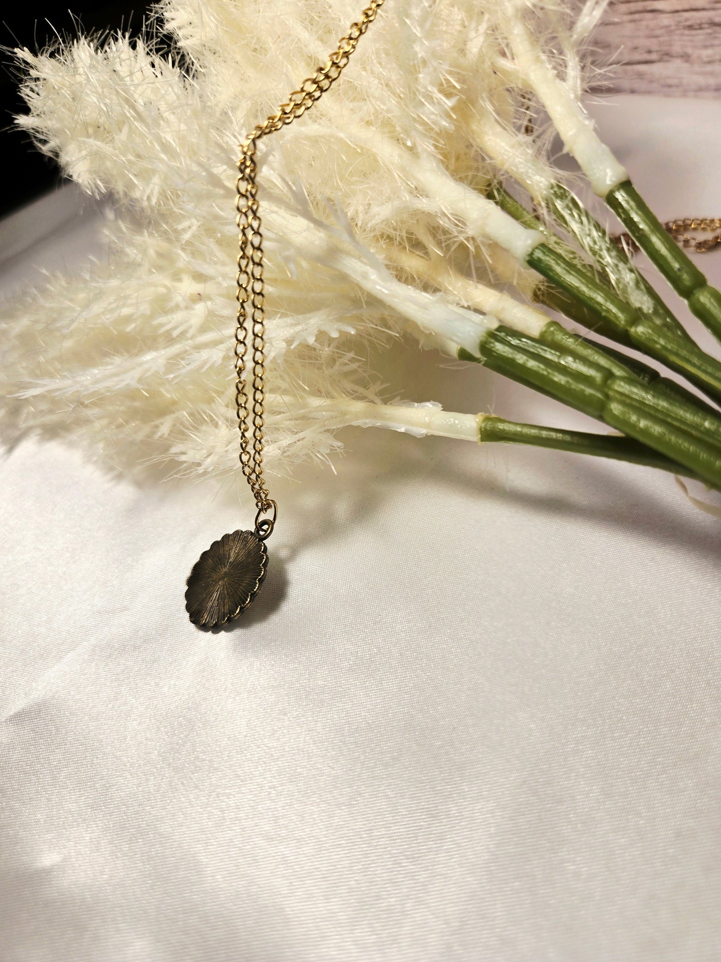 Pressed Yellow Flower Necklace – Vintage Bronze Botanical Pendant with Script Background