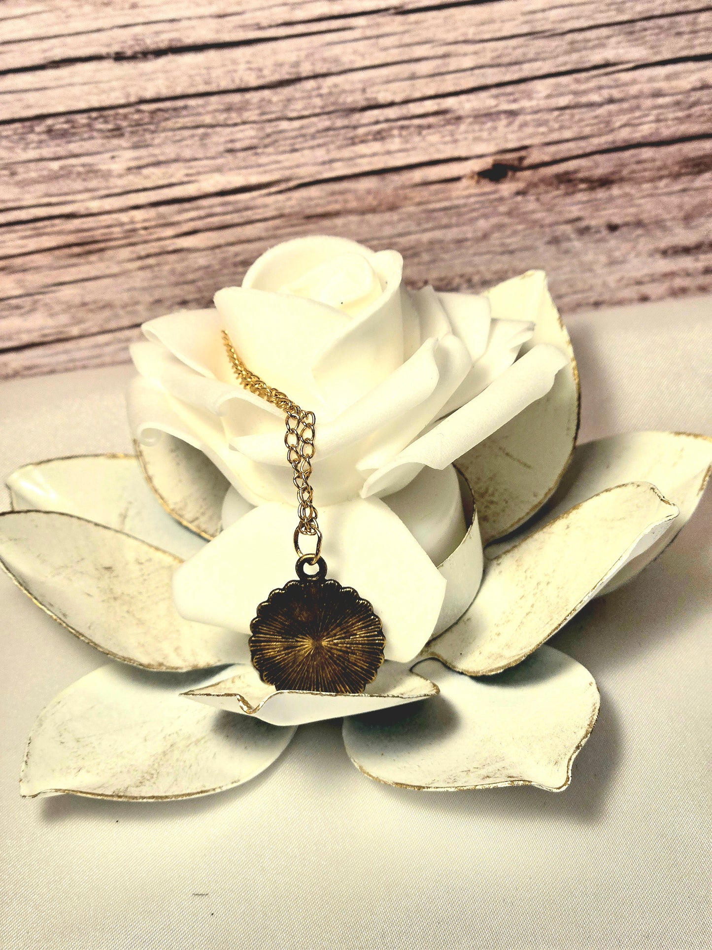 Pressed Yellow Flower Necklace – Vintage Bronze Botanical Pendant with Script Background