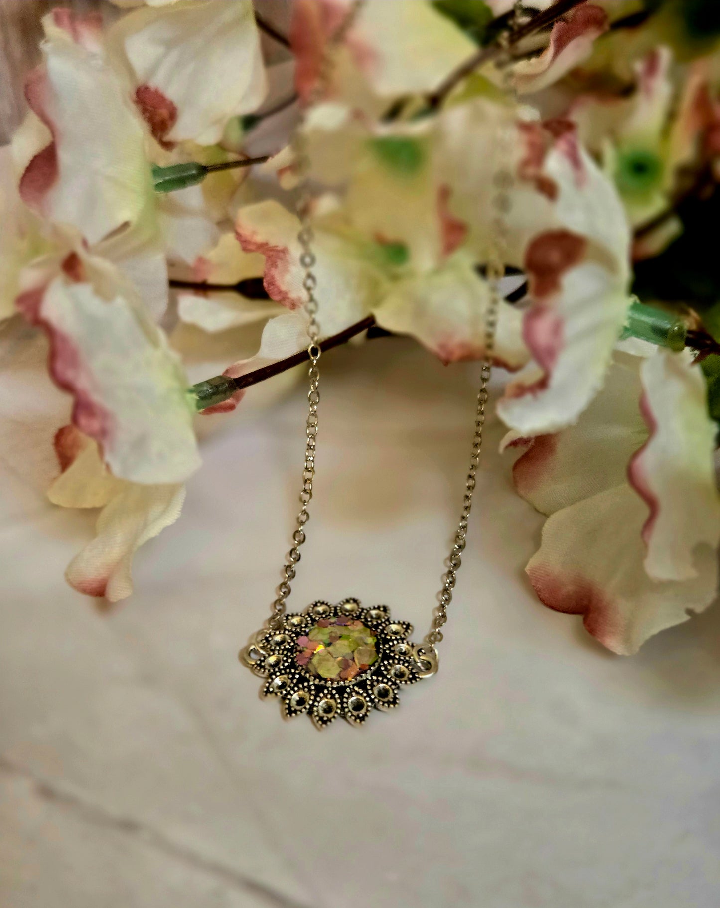 Iridescent Floral Crystal Necklace – Vintage Silver Sunburst Pendant