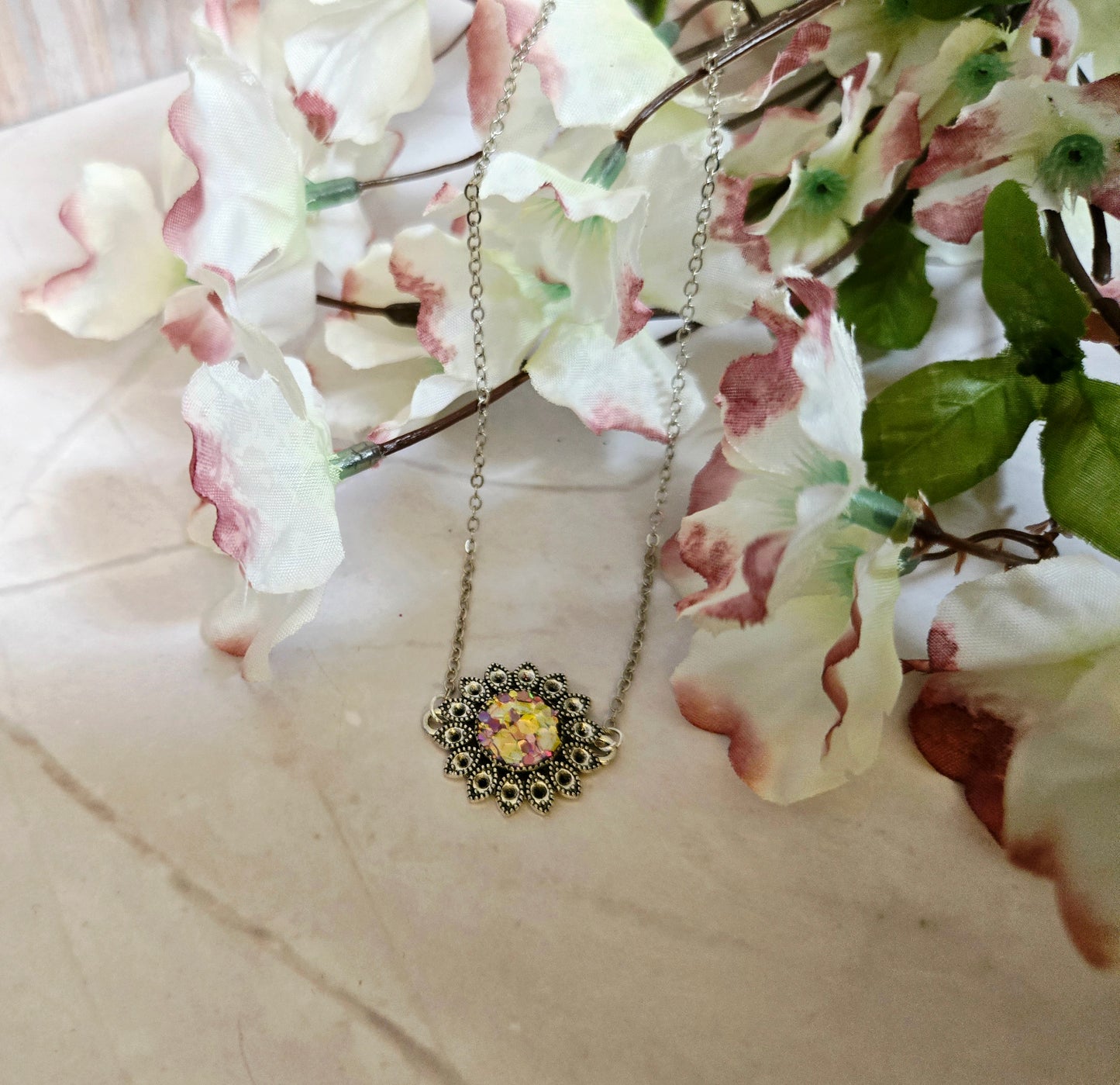 Iridescent Floral Crystal Necklace – Vintage Silver Sunburst Pendant