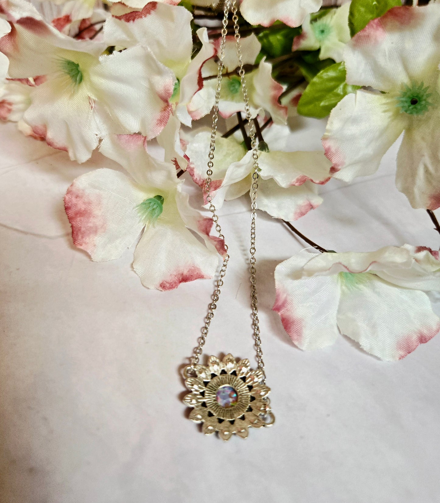 Iridescent Floral Crystal Necklace – Vintage Silver Sunburst Pendant