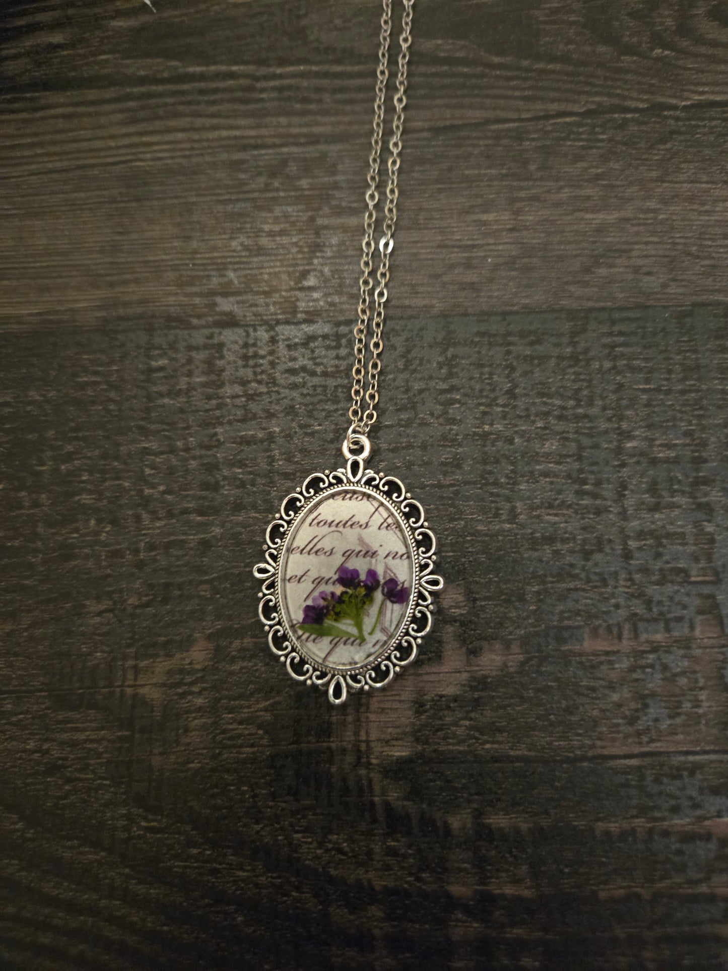 Vintage Floral Necklace with Real Purple Flowers and Script Background – Antique Style Oval Pendant – Botanical Jewelry Gift for Her