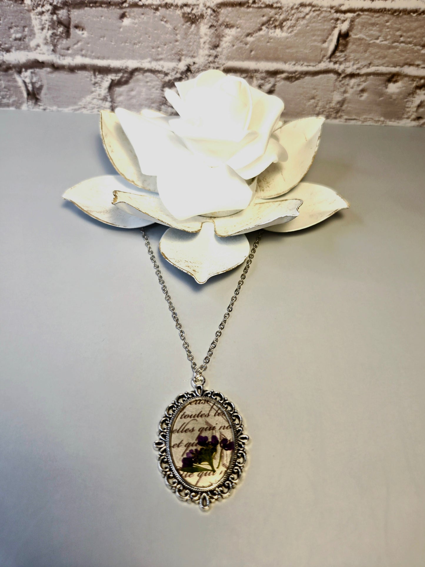 Vintage Floral Necklace with Real Purple Flowers and Script Background – Antique Style Oval Pendant – Botanical Jewelry Gift for Her