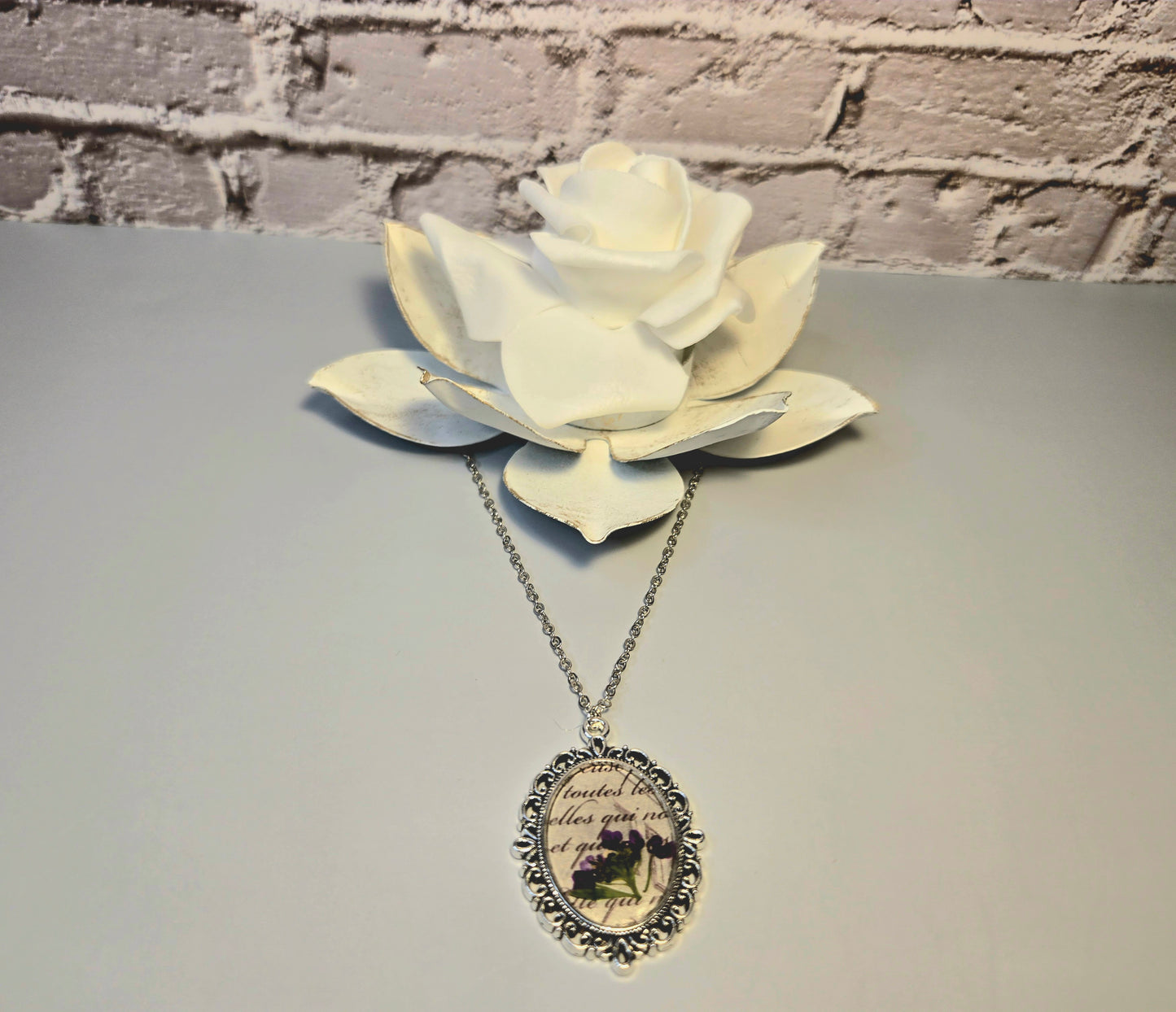 Vintage Floral Necklace with Real Purple Flowers and Script Background – Antique Style Oval Pendant – Botanical Jewelry Gift for Her