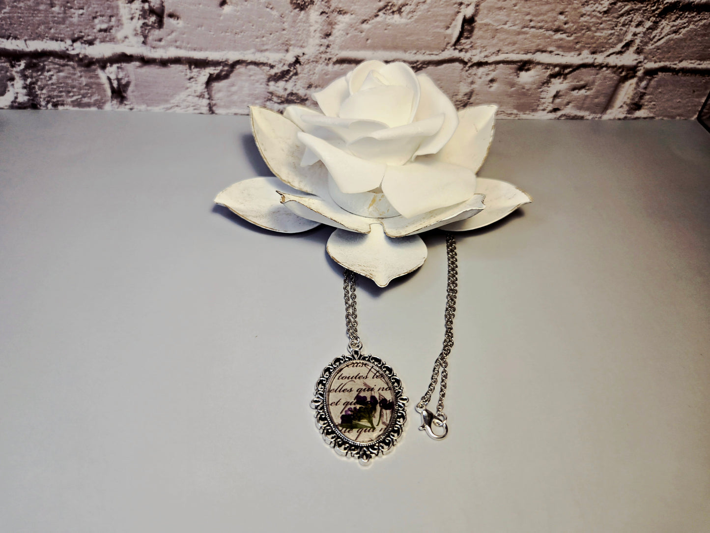 Vintage Floral Necklace with Real Purple Flowers and Script Background – Antique Style Oval Pendant – Botanical Jewelry Gift for Her