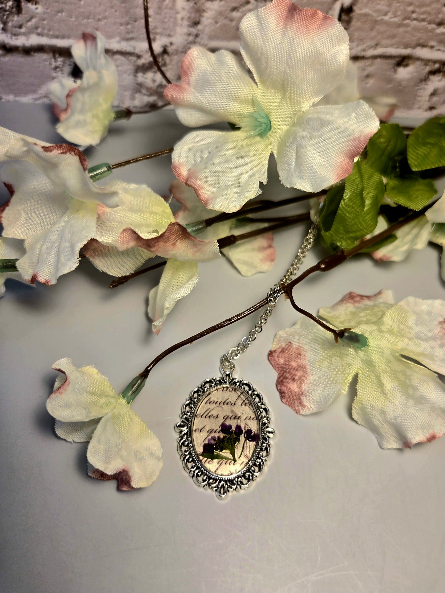 Vintage Floral Necklace with Real Purple Flowers and Script Background – Antique Style Oval Pendant – Botanical Jewelry Gift for Her