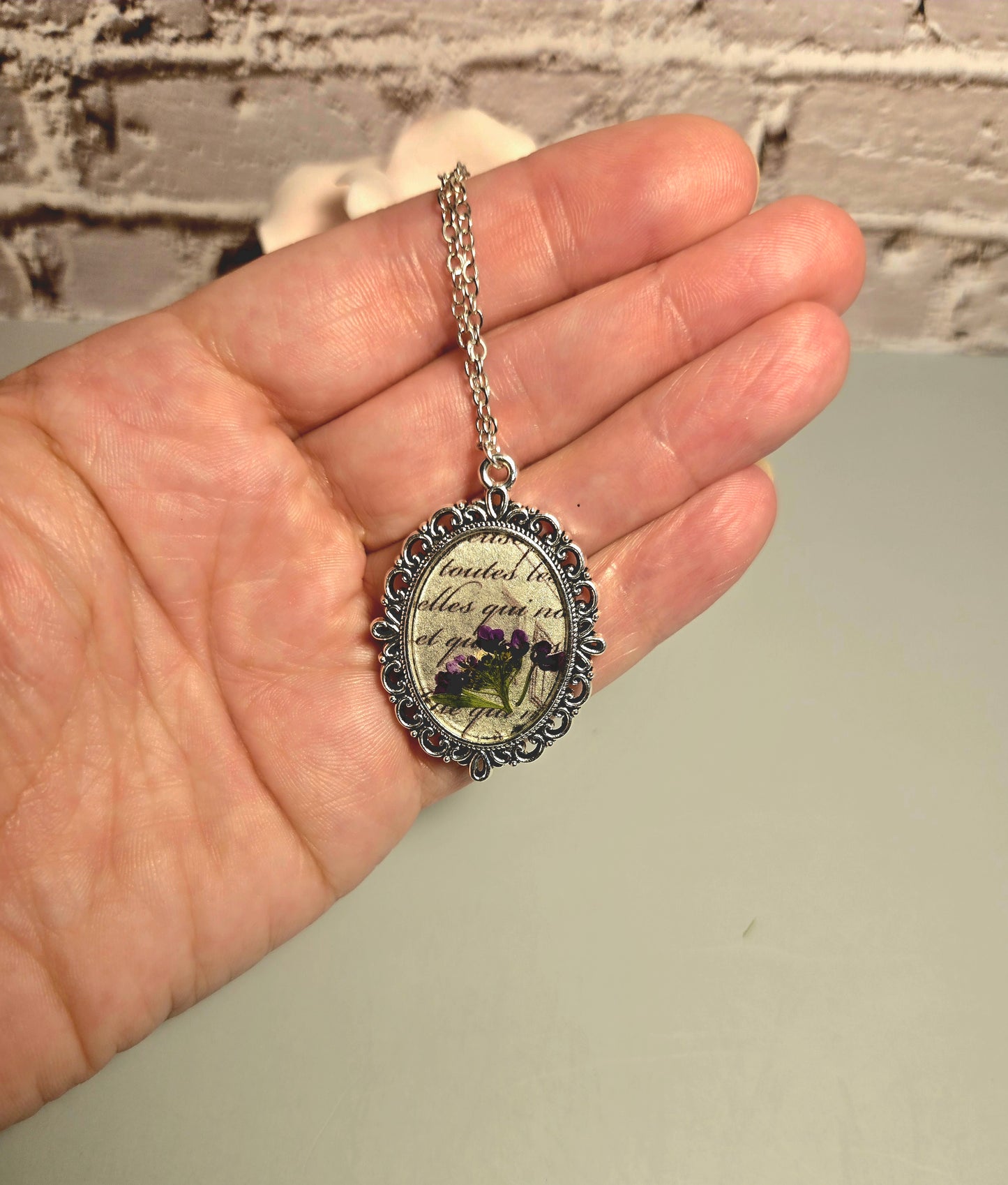 Vintage Floral Necklace with Real Purple Flowers and Script Background – Antique Style Oval Pendant – Botanical Jewelry Gift for Her